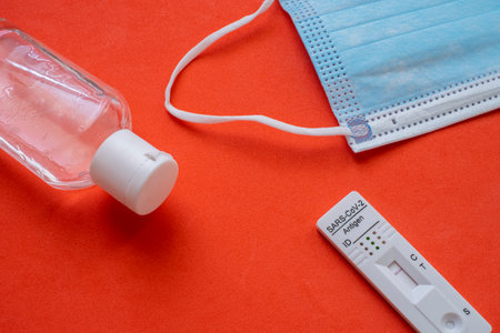 virus antigen test, , sars, , with negative reult, together with a surgical face mask and a hydrogel...