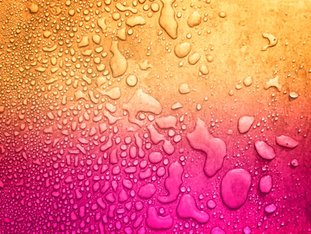 water drops of different sizes on a degraded surface pink and orange surface, drops texture, rain on...