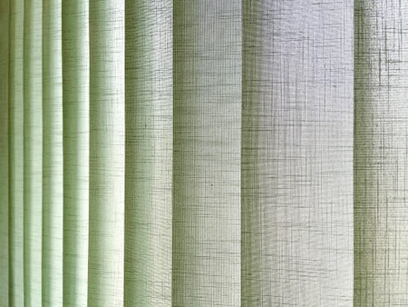 textile venetian blinds, green slat curtains texture, green store curtains and blinds background, horizontalの写真素材