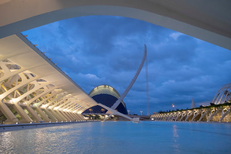 The city of the Arts and Sciences, Ciudad de las Artes y las Ciencias at blue hour, in Valencia, futuristic buildings surrounded by water, Spain, horizontalの写真素材