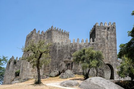 exterior of the 10th century castle in Old Town of Guimaraes city, Portugalの写真素材