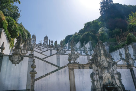 wide angle view of the baroque staircase of Bom Jesus do Monte Sanctuary in Braga, Portugal, with...