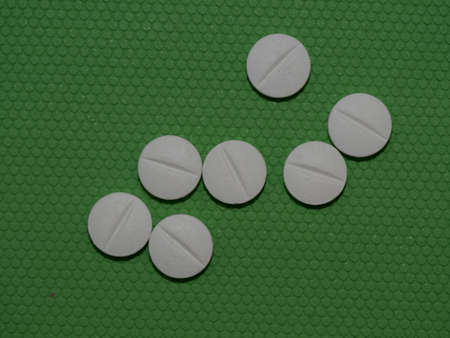 Pills Medicine on green backgroundの写真素材