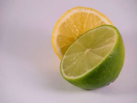 Lime and lemon on white backgroundの写真素材