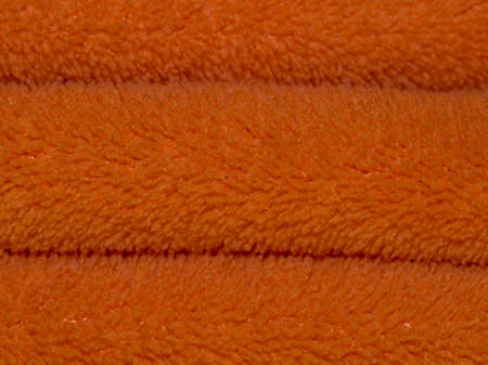 Close-up of orange towels, can be used as background or textureの写真素材