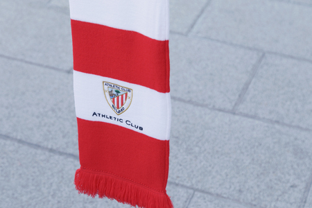 BILBAO, SPAIN - APRIL 28, 2017: Athletic Club soccer team emblem, embroidered on a scarf. Outdoors, on the street.のeditorial素材