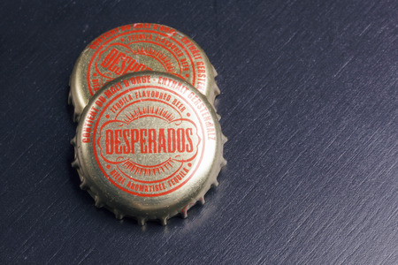 BILBAO, SPAIN - OCTOBER 11, 2017. Bottle caps of Desperados beer.のeditorial素材