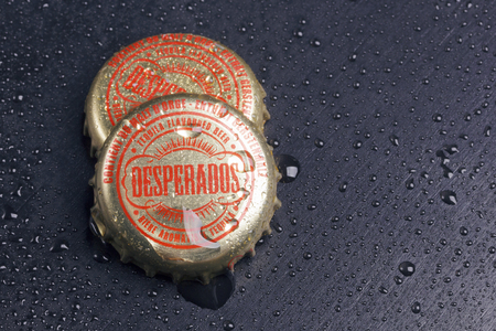 BILBAO, SPAIN - OCTOBER 11, 2017. Bottle caps of Desperados beer.のeditorial素材