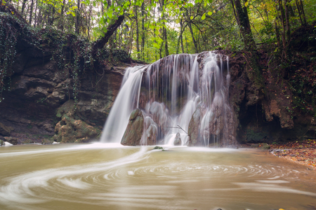 Altube waterfall in the Gorbea Natural Park, Basque Country, Spain. Long exposure in a cloudy day.の写真素材