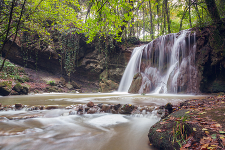 Altube waterfall in the Gorbea Natural Park, Basque Country, Spain. Long exposure in a cloudy day.の写真素材