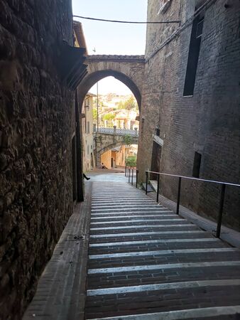 Peruggia, Italy.  September, 30, 2019: down stairs between alleysの写真素材