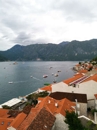 view to the ocean, houses and mountainsの写真素材