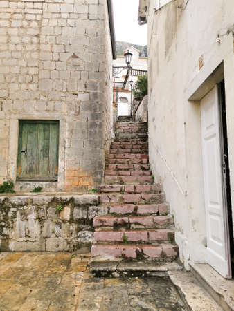 stairs, alley architecture with white housesの写真素材