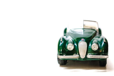 Vintage toy car isolated on white background with copy space for textの写真素材