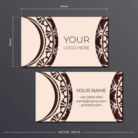 Vector Template for print design of business cards in beige color with luxurious patterns. Preparing a business card with a place for your text and an abstract ornament.のイラスト素材