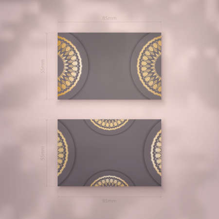 Business card template in brown color with Indian gold ornaments for your business.のイラスト素材
