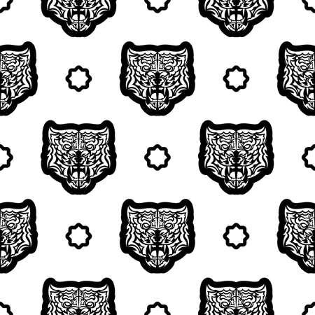 Black and white Seamless pattern with tiger face in boho style. Polynesian style tiger face. Good for backgrounds and prints. Vector illustration.のイラスト素材