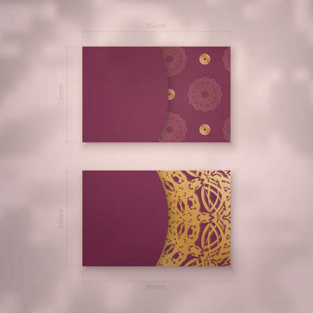 Presentable business card in burgundy color with vintage gold ornament for your contacts.のイラスト素材