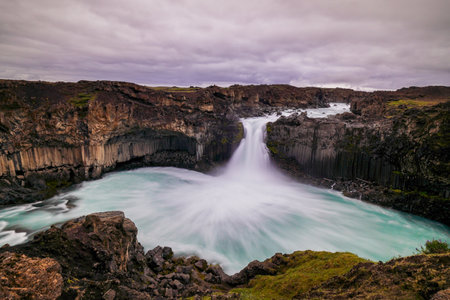 The basalt columns are more twisted and chaotic than in other places, for instance svartifoss, but they show the raw power of the earth as this incredible feature was formed. First by lava and then woの写真素材