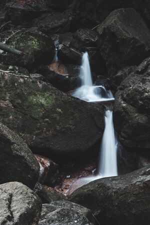 Waterfall on a Black Brook in Jizera Mountains, Hejnice, Czech Republicの写真素材