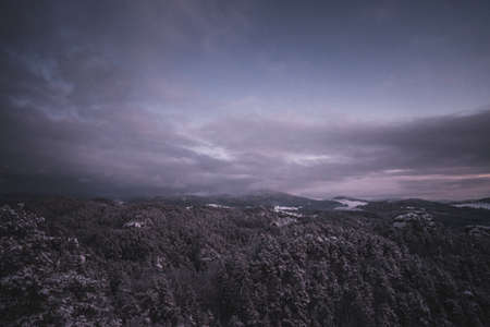 Majestic winter landscape during sunset in Bohemian Switzerland Dramatic wintry scene. Jetrichovice, Czech Republicの写真素材