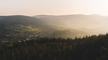 Beautiful sunrise in Krkonose, captured from lookout called Straz above city Rokytnice nad Jizerou,...