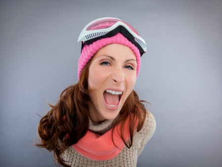 portrait of funny female enjoying isolatedの写真素材