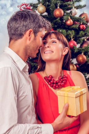 romantic christmas couple at homeの写真素材