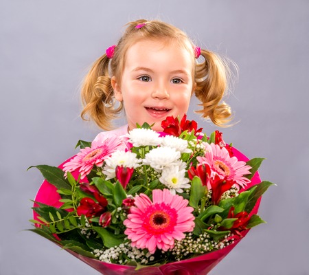 happy laughing giving giftの写真素材