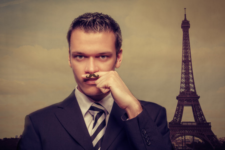 smiling man in paris conceptの写真素材