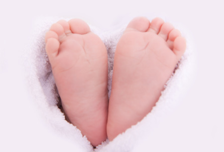 babylove little feets in towelの写真素材