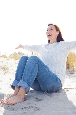 relaxing with the sun in the neck carefree coastsideの写真素材