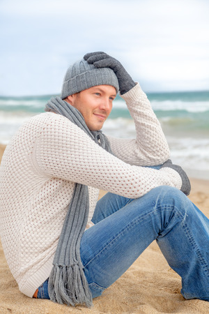 relaxing male on coast enjoying lifeの写真素材