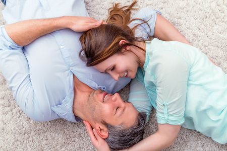 romantic flirting lovers at homeの写真素材