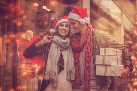 couple shopping for christmas in wintertimeの写真素材