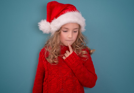 little cute girl thinking for presentの写真素材