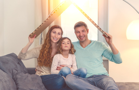 family in house planning with daughterの写真素材