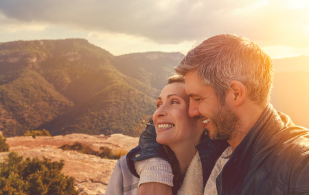 couple in the top of the mountainsの写真素材