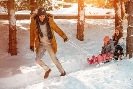 happy funny winter family actionの写真素材