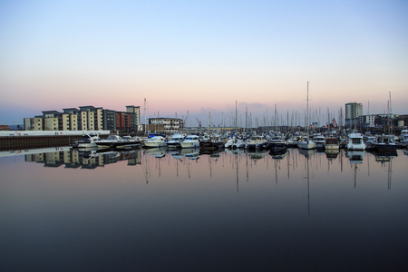 Swansea, UK: September 25, 2015: Swansea marina at night. Deep water created by the new barrage at the mouth of the River Tawe makes this new marina possibleのeditorial素材