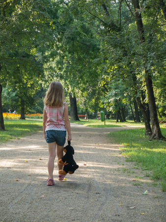 abandoned sad girl in the parkの写真素材