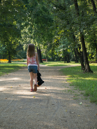 abandoned sad girl in the parkの写真素材
