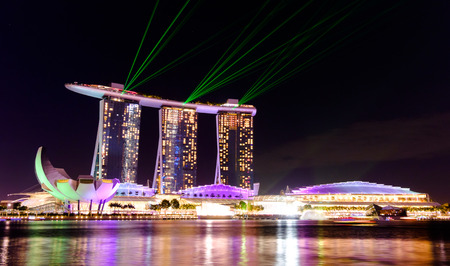 Singapore cityscape at night buildings of Marina Bay Sand laser show , Singapore - 30 January 2015のeditorial素材