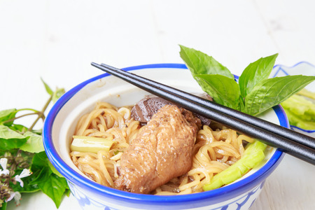 Noodle soup with chicken asia food on white wooden backgroundの写真素材