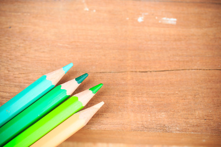 close up colored pencils on wooden backgroundの写真素材
