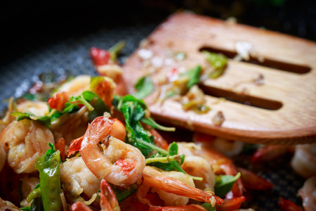 close up prawns spicy with hot basin cooking in panの写真素材