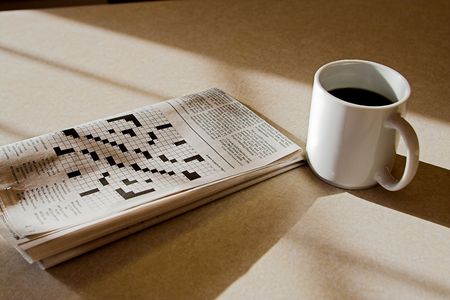 morning coffee and crosswordの写真素材