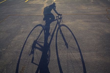 Bicycle rider shadowの写真素材