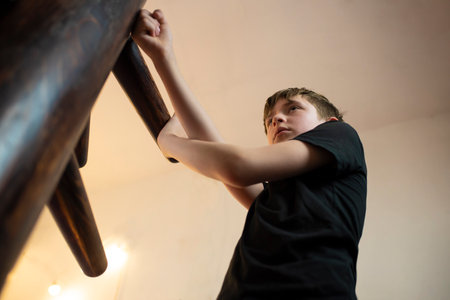 teenager boy training with Wingchun wooden dummy, 11 year old child training wushu, Yunchunquan...
