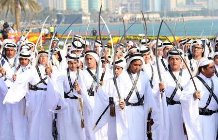 Qatari Girls and boys with traditional dress on Qatar national day celebration  18-12-2020 - QATARのeditorial素材